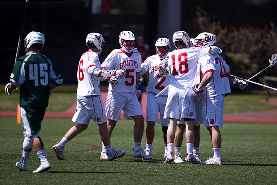BU lacrosse players celebrate after beating Lehigh University in the 2017 Patriot League playoffs