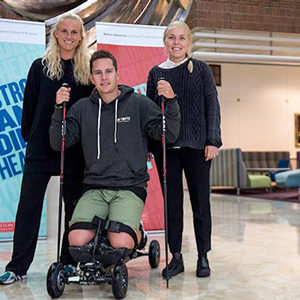 Exero Technologies team members enrolled in the Norway Entrepreneurship Program at Questrom School of Business pose with the Exero Spike sled product they developed