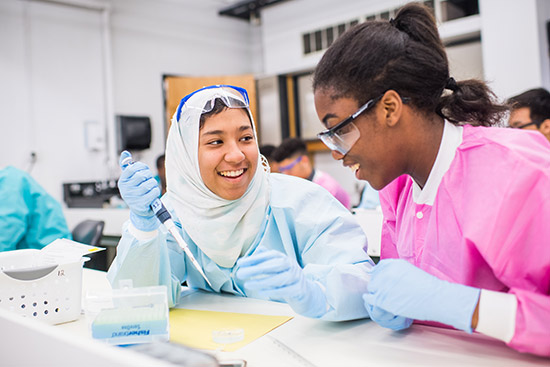 Boston and Brookline high school students work on an experiment as part of the Youth to Health Careers (Y2HC) program at the Boston University School of Medicine.