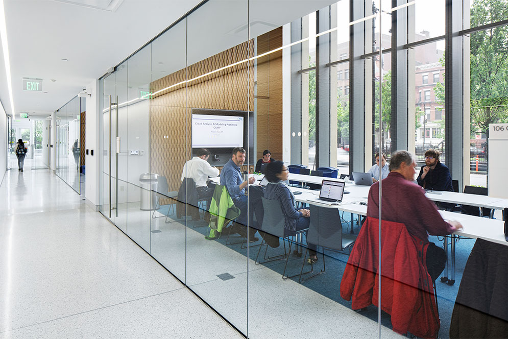 Meeting in a conference room at the Rajen Kilachand Center for Integrated Life Sciences and Engineering science building at Boston University