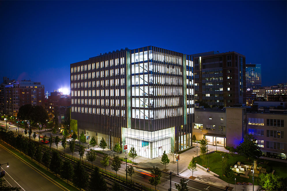 night photo of the rajen kilachand center for integrated life sciences and engineering science building at boston university