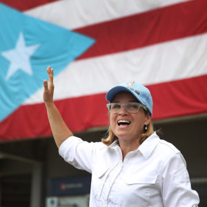 San Juan Mayor Carmen Yulin Cruz speaks to the media as she arrives at the temporary government center setup at the Roberto Clemente stadium in the aftermath of Hurricane Maria on September 30, 2017 in San Juan, Puerto Rico.