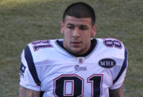 Aaron Hernandez as an NFL player with the New England Patriots