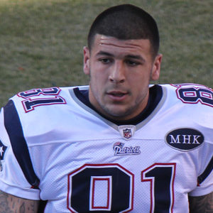Aaron Hernandez as an NFL player with the New England Patriots