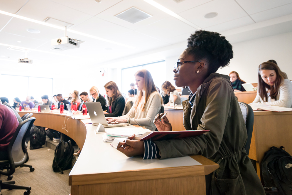 Students follow along during a class at the Boston University School of Law