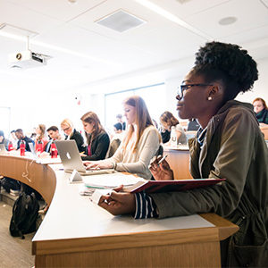 Students follow along during a class at the Boston University School of Law
