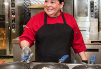 Omelette maker Cecelia Lopez works her magic at The Warren Towers dinging hall January 23, 2018