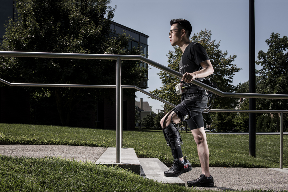 Man walking in a medical exosuit designed to help stroke victims walk