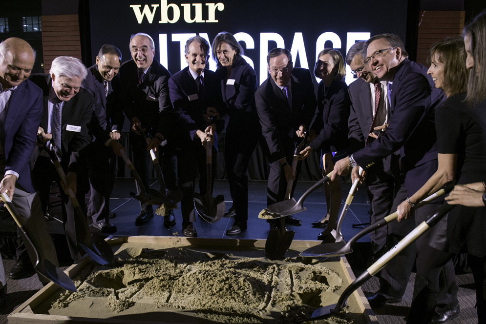 Lead funders for WBUR’s CitySpace dig their shovels into a pit of sand during the ground breaking ceremony and celebration of the upcoming, state-of-the-art multimedia venue.