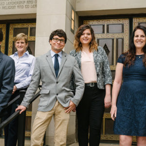 Marsh Chapel This I Believe Sunday speakers Evan Armacost, Anne Marie Kelley, Nickholas Rodriguez, Maritt Nowak, and Robin Masi pose for a photo in front of Marsh Chapel at Boston University