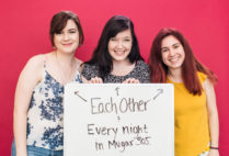 Students holding a sign that they will miss each other