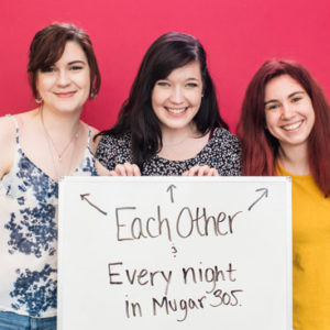 Students holding a sign that they will miss each other