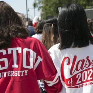 Students from the Boston University Class of 2022 march down Commonwealth Ave toward the Matriculation ceremony wearing Boston University Class of 2022 t-shirts