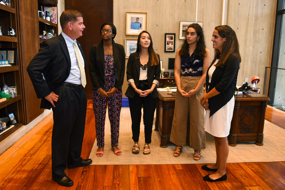 Boston Mayor Martin Walsh (from left) with BU City Scholars Summer Fellows Sophia Dorsainvil-Johnson (Wheelock’20), Mandy Yao (Sargent’20), Yasly Landestoy (Sargent’20), and Karina Ferzoco (Questrom’20). The four spent the summer working as interns at City Hall, paid by BU’s Office of Government and Community Affairs. Not in photo: John O’Brien (CAS’19) and Tatyana Fonseca (CAS’20). Photo courtesy of city of Boston