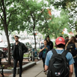 students walk down commonwealth ave