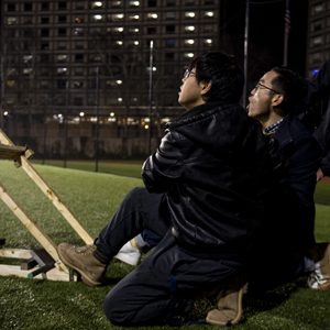 Kai Hui and Tai Kang launch their catapult with the help of Lei (Ray) Shi during the College of Engineering's Tinker Catapult Challenge launch day.