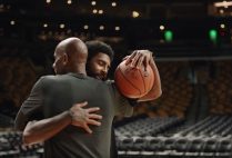 Kyrie Irving hugs his dad, Drederick Irving