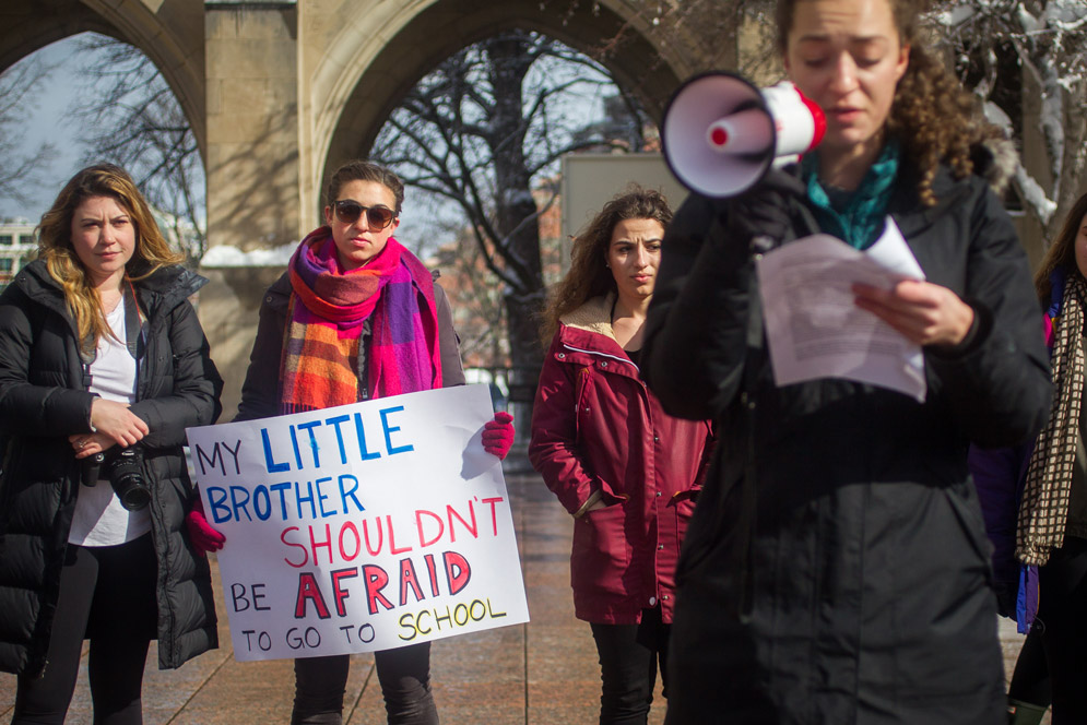 National School Walkout, March 14: A nationwide memorial and protest action honoring the 17 people killed February 14 in Florida and urging passage of stricter gun control laws was observed at BU: Jackie O’Brien (COM’20) (from left), Lindsay Fuori (CFA’18), Annie Zaruba-Walker (CFA’18), and Shawna James (CFA’18). Photo by Cydney Scott