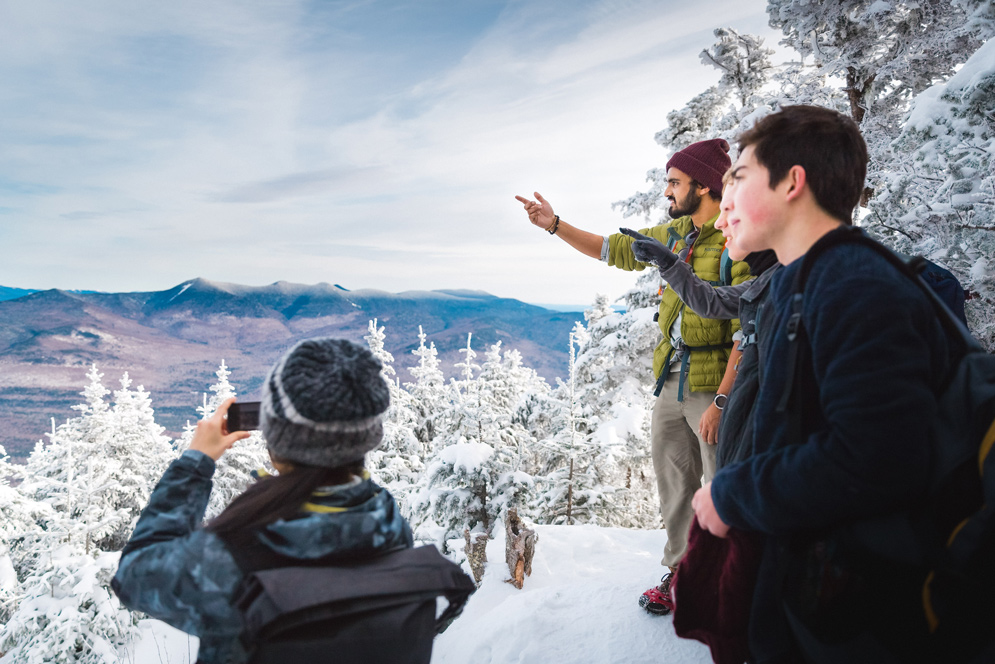 Chujun Lu (COM’18) (from left), Huzefa Mandviwala (ENG’19), Devin Bidstrup (ENG’22), and Kaiya Weatherby (CAS’21) were among the BU Outing Club members who hiked to the summit of New Hampshire’s Mount Tecumseh November 25. Photo by Jacob Chang-Rascle (COM’22)