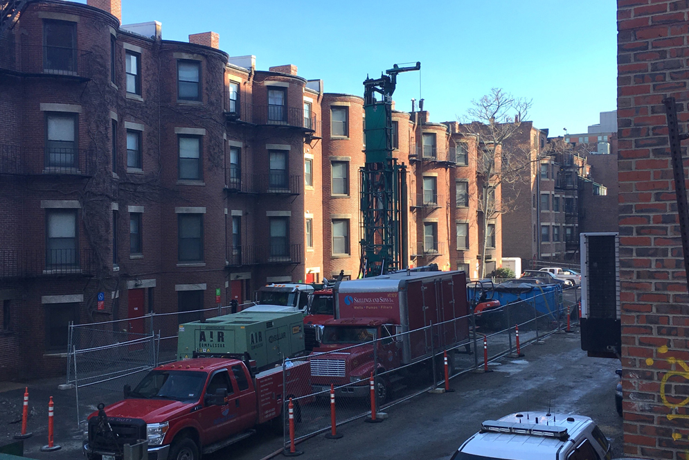 The first new geothermal wells—each 1500 feet deep—have been drilled into the subterranean layers of the new BU Data Sciences Center