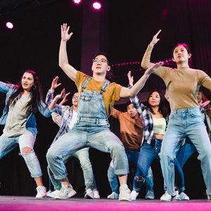 The Fusion dance team performs on stage