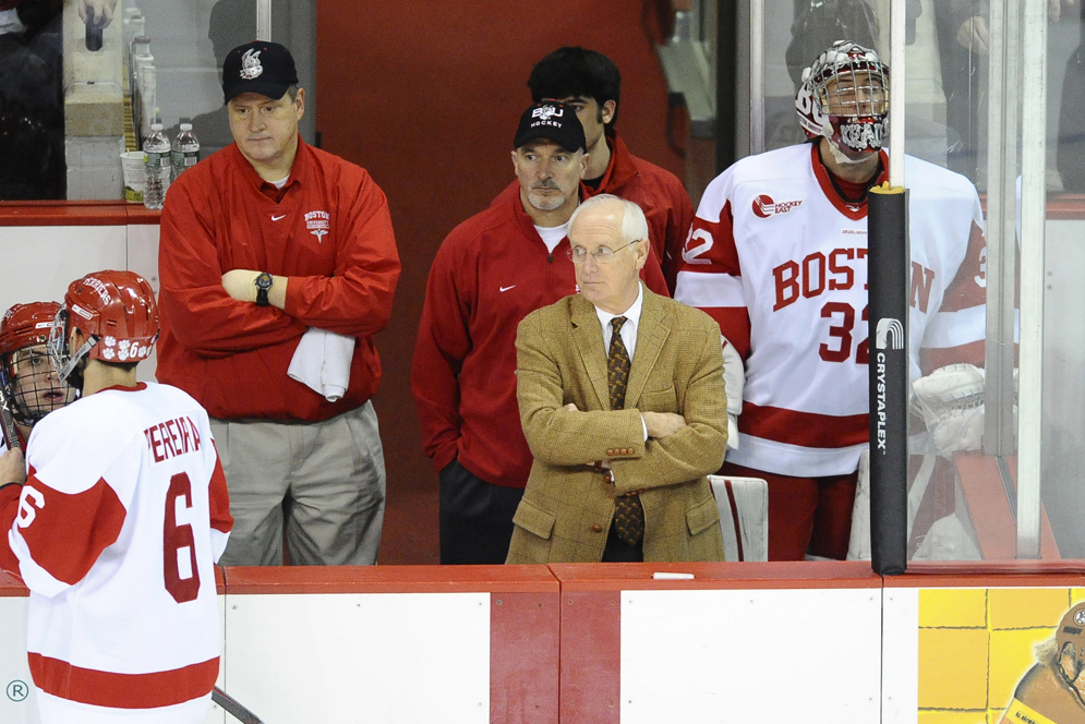 Venis and DiMella on the bench with terriers