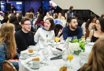 Students talk and laugh at the BU senior breakfast in Metcalf Hall, May 3, 2019.