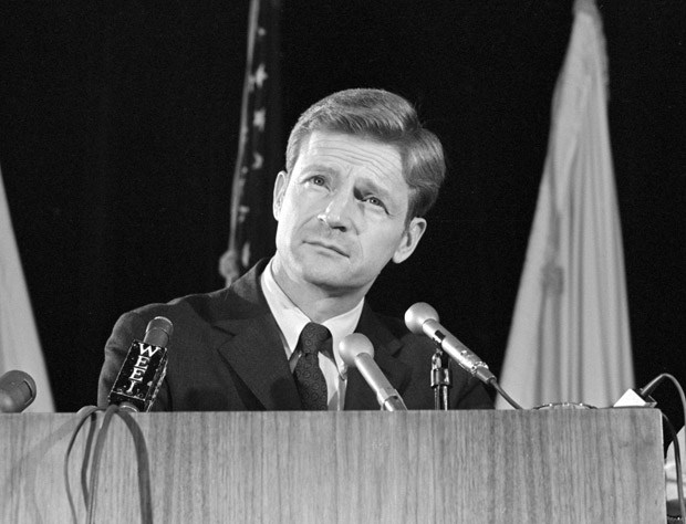 John Silber standing at podium