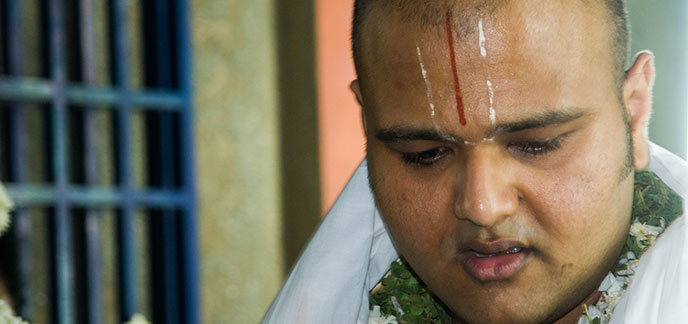 Rahul Desikan forehead painted and in traditional dress during his wedding to Maya in 2008.