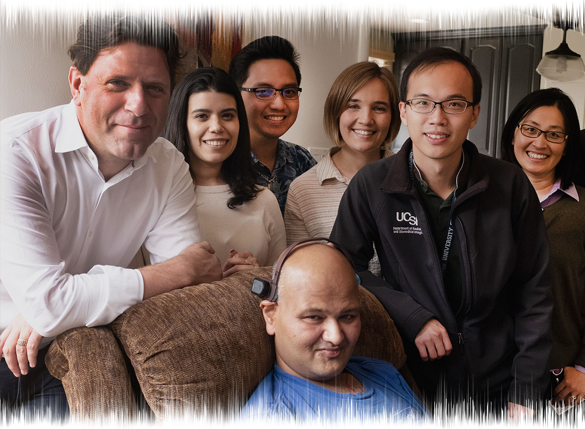 Portrait of Rahul Desikan (front) at his home in San Francisco with his ALS research team, lab partner Leo Sugrue (from left) and the members of their lab team, Iris Broce, Ryan Nillo, Maria Olaru, Chin Hong Tan, and Yi Li.