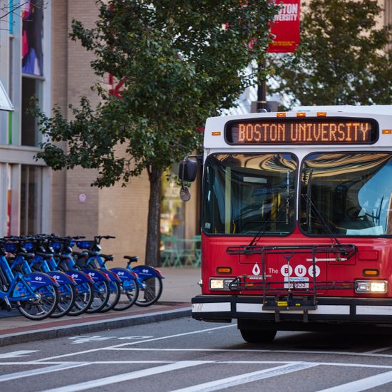 The BU shuttle on Commonwealth Avenue in front of Warren Towers