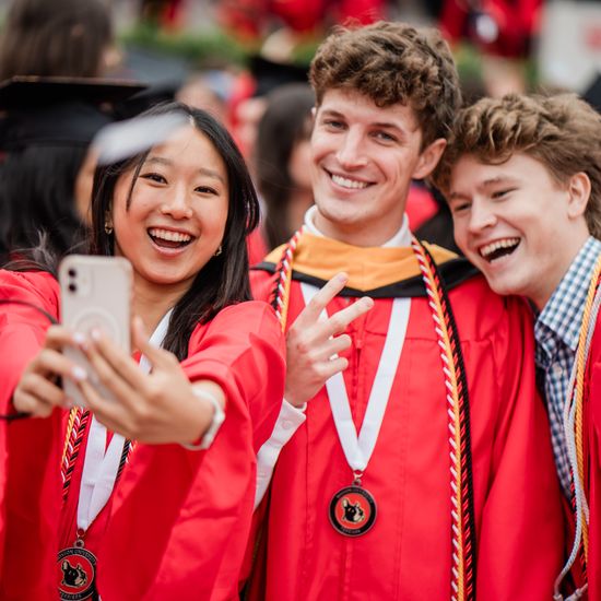 Graduates capture the moment at BU’s Commencement at Nickerson Field