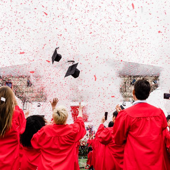 Confetti and mortar boards fly at BU’s Commencement ceremony at Nickerson Field