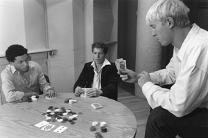 Poker becomes more than a game for (left to right) Rod Brady (CFA'03) as Frankie, Paul Cortez (CFA'03) as Carl, and Andrew Sneed (CFA'03) as Mugsy. Photo by Kalman Zabarsky