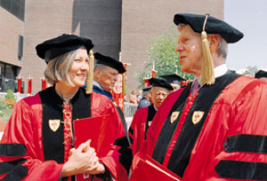 Honorary degree recipients Karen Elliott House and Van Cliburn line up for the processional. Photo by Kalman Zabarsky 