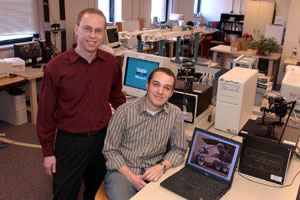 ENG graduate student Matt Heverly (ENG’05) (right), who came to BU to further study robotics and controls, and Pierre Dupont, an ENG associate professor of aerospace and mechanical engineering. Photo by Vernon Doucette