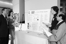 At the regional GK-12 meeting's poster session on January 23 (from left): meeting organizer Bennett Goldberg, a CAS physics professor, Kelly Denney (CAS'04), a GK-12 fellow at Boston Latin School, Andrew Walsh (GRS'05), a GK-12 fellow at East Boston High School, and Malik Latif, a physics teacher at East Boston High School. Photo by Kalman Zabarsky 