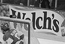 Television viewers of February’s Beanpot tournament, played at the FleetCenter, undoubtedly noticed the remarkable performance of goaltender Sean Fields (CAS’04). They also might have been aware that Dunkin’ Donuts and Welch’s didn’t have to wait for commercial breaks to advertise on the airwaves. Photo by Albert L’Étiole