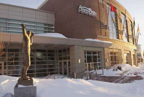 The morning after. On January 24, a chilly sunrise greeted the Charles River Campus, where the previous day a blizzard dumped more than two feet of snow. Photo by Kalman Zabarsky.