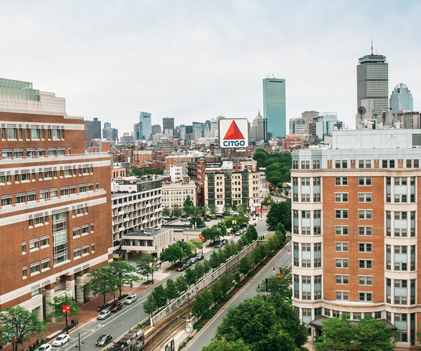 View looking east toward downtown Boston from the new CILSE building. The Questrom School of Business building at the CITGO sign are also visible.