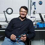 Renato Mancuso sitting at a work bench
