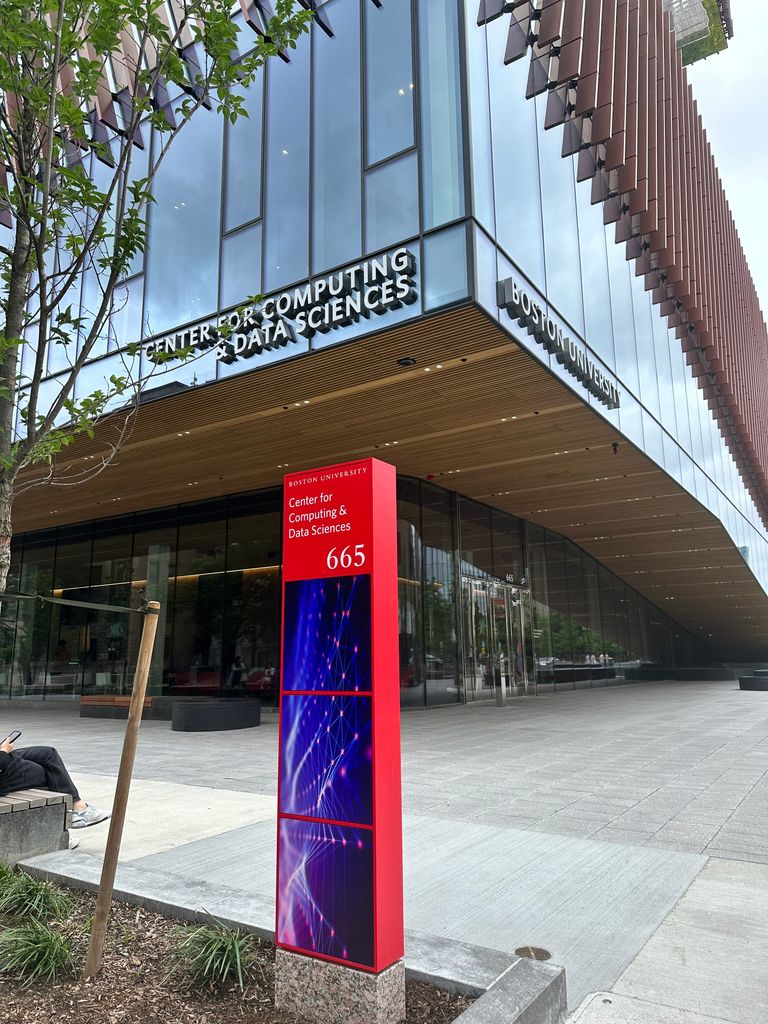 Photo of front sidewalk and windows of BU Center for Computing & Data Sciences