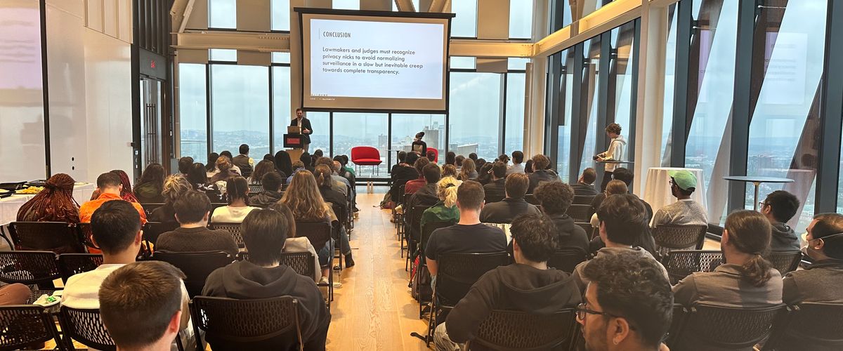 Photo of large audience group sitting on the BU Center for Computing & Data Sciences 17th floor