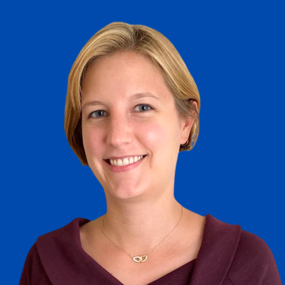 Headshot of Lauren Wheelock with a blue background, Faculty of Computing & Data Sciences