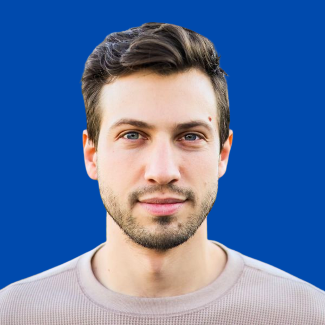 Headshot of Pawel Przytycki in front of a blue background, BU Faculty of Computing & Data Sciences