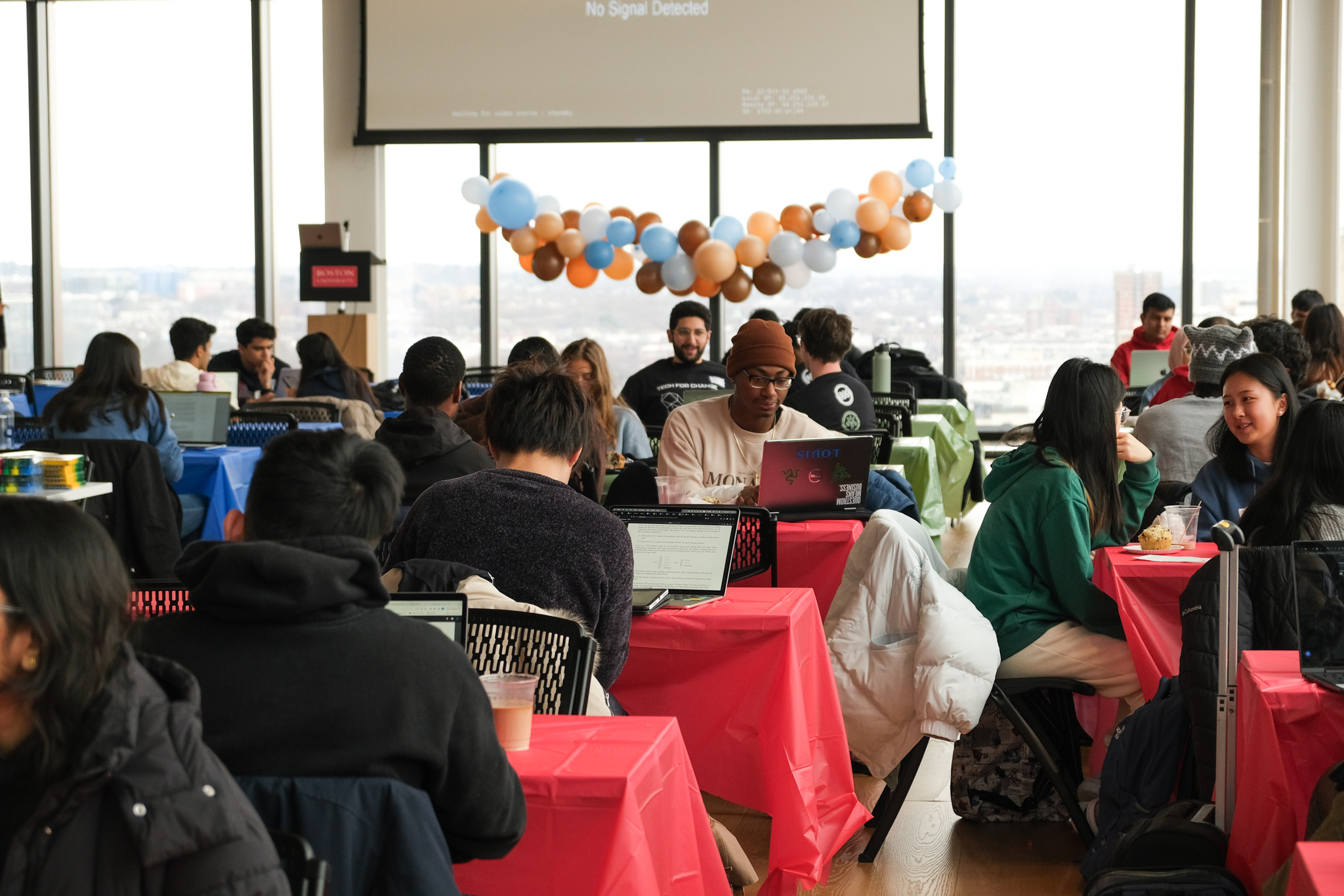 Photo of students working in CDS 1750 at Hackathon