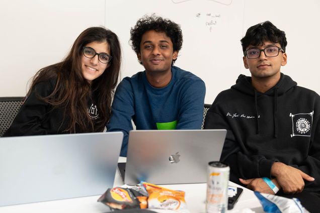 Students collaborating at the DS + X Hackathon 2025