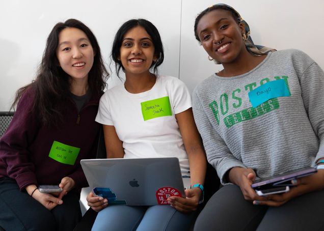 Students collaborating at the DS + X Hackathon 2025