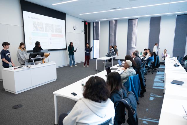 Students collaborating at the DS + X Hackathon 2025