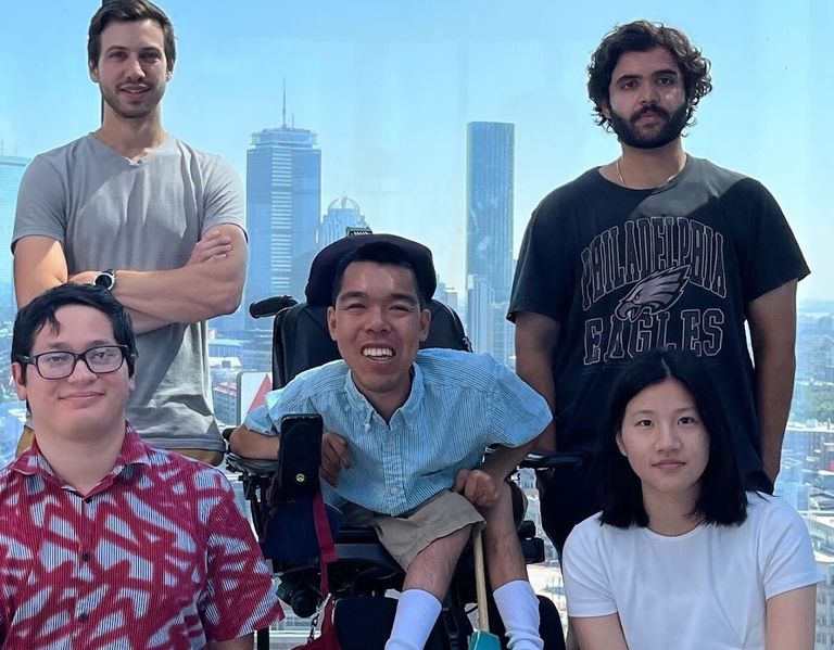 Photo of CDS Assistant Professor Pawel Przytycki and lab students